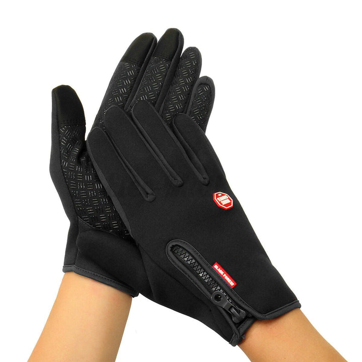 Thin thermal touchscreen winter gloves, offering warmth without bulk for outdoor use.