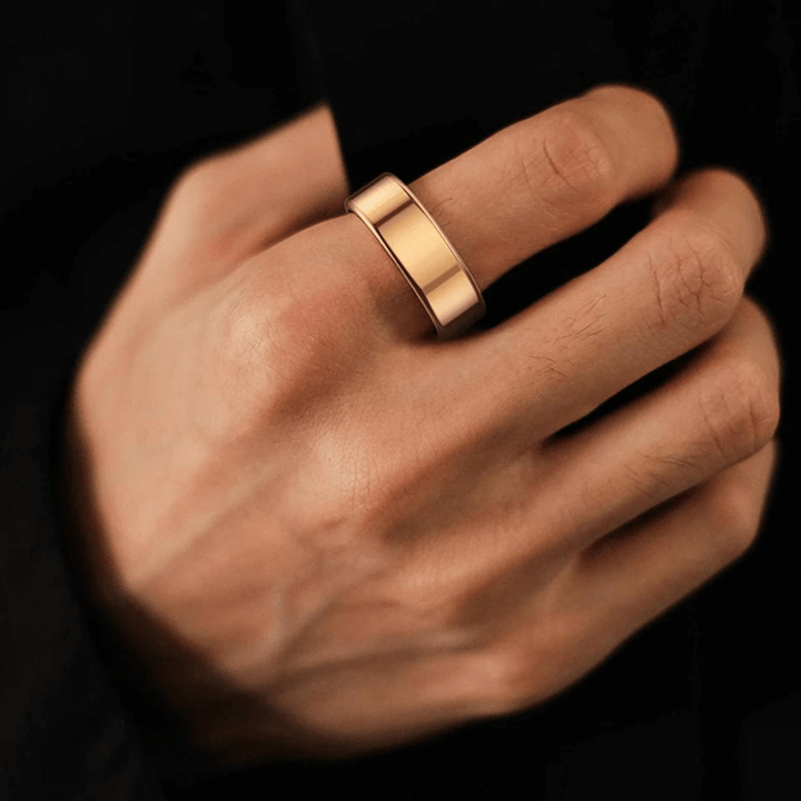 Stylish gold titanium smart ring: an advanced heart rate, SpO2, and sleep monitor for daily health.