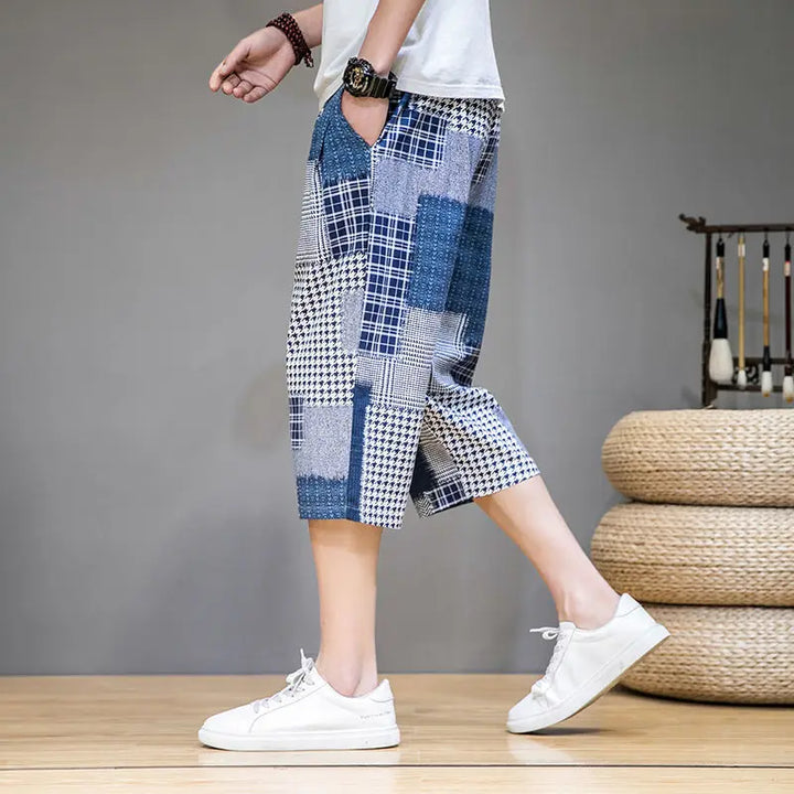 Unisex trendy patchwork capris shorts. Bold, unique streetwear style, perfect for casual summer wear.