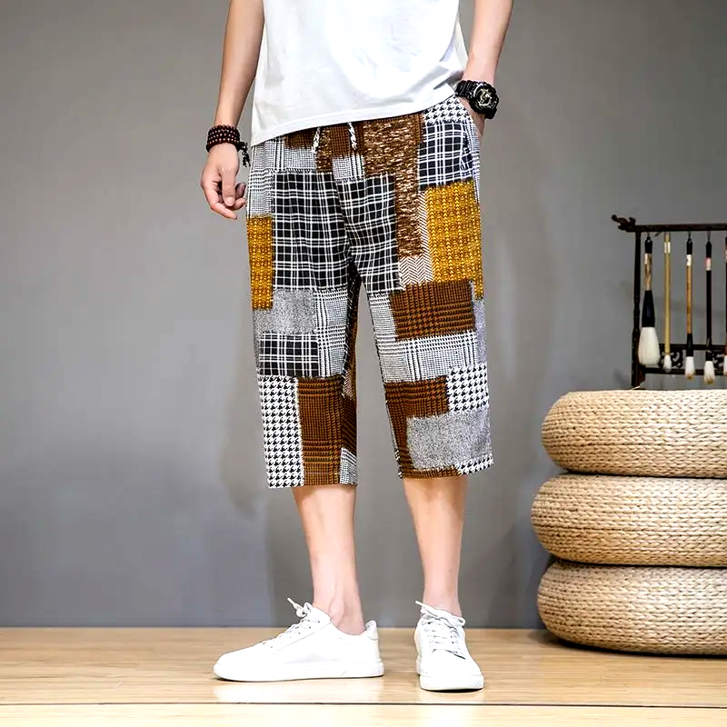 Comfortable unisex patchwork capris shorts, offering a unique and trendy look for spring & summer fashion.