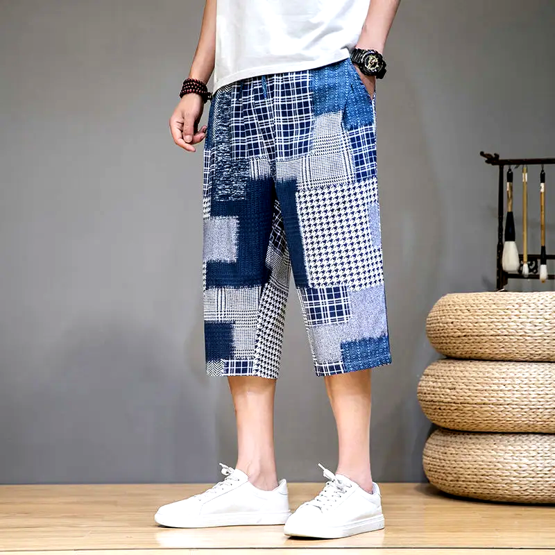 Distressed patchwork capris shorts for unisex. Trendy, bold style for casual streetwear and summer outfits.