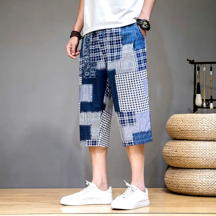 Distressed patchwork capris shorts for unisex. Trendy, bold style for casual streetwear and summer outfits.