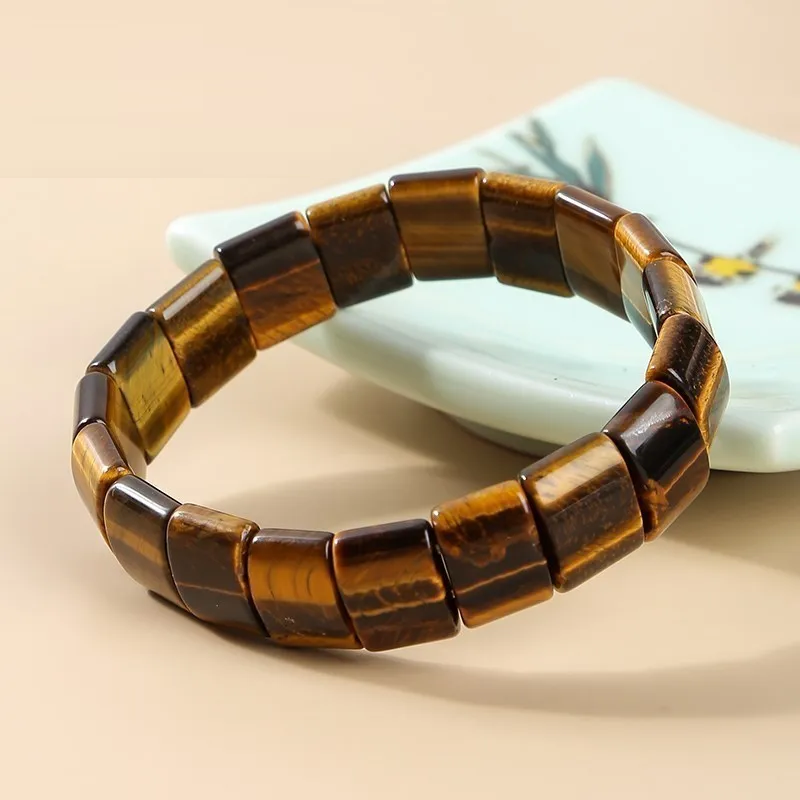 Vibrant Tri-Color Natural Tiger Eye gemstone bracelet. Natural stone, stretch, and healing crystal jewelry.
