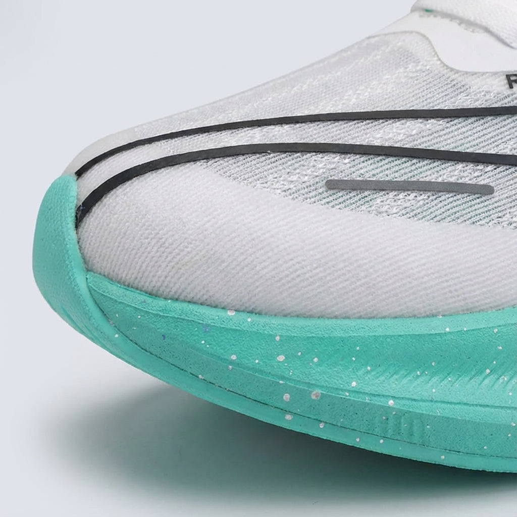 Close-up of Trinity unisex cushioned running shoe sole, highlighting road performance.