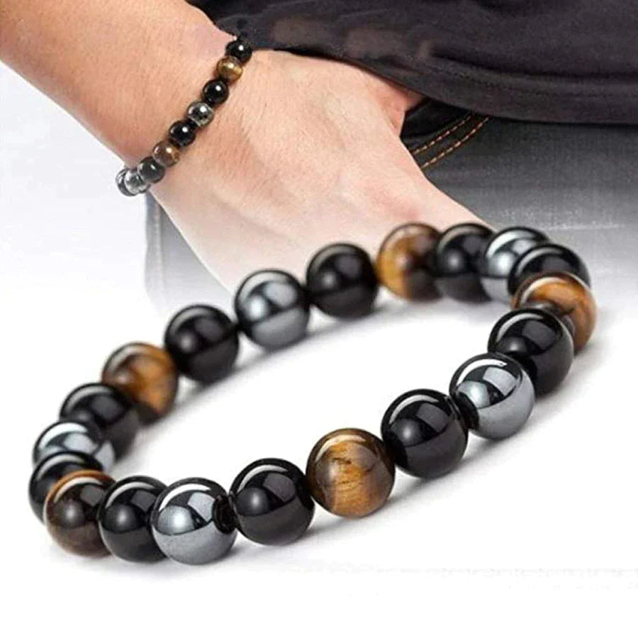 Stylish natural stone bracelet with obsidian, hematite, and tiger eye, offering spiritual protection.