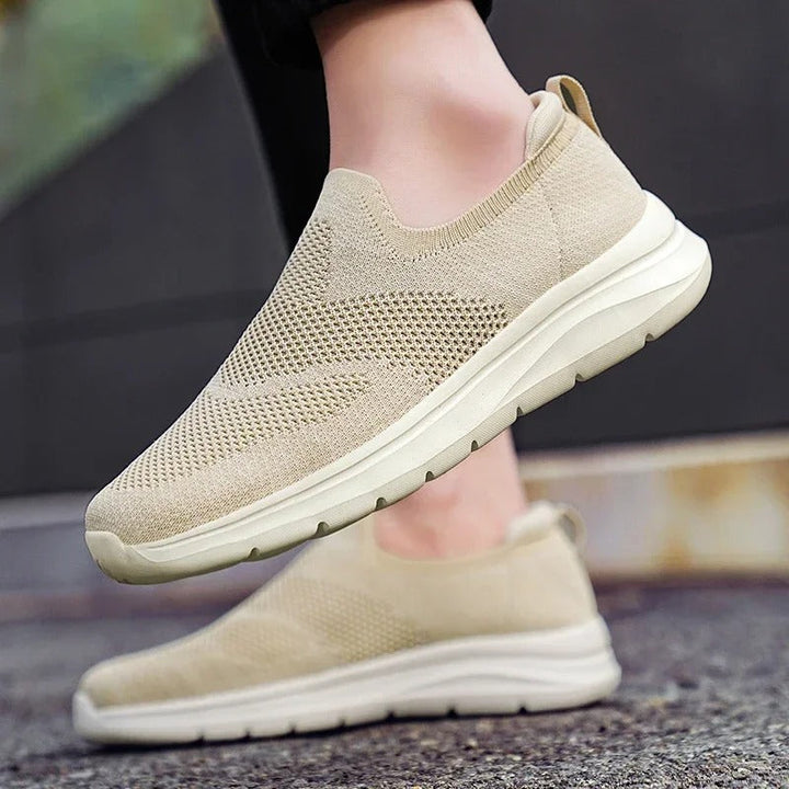 Breathable knit slip-on walking shoes, unisex design for all-day comfort and easy wear.