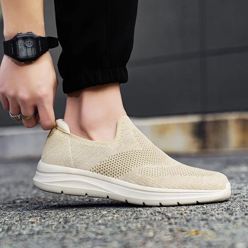 Lightweight comfort sneakers, laceless knit slip-on style, great for casual unisex fashion.