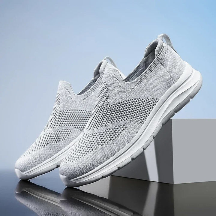 Unisex knit walking shoes, ultra comfortable with a convenient slip-on, breathable design.