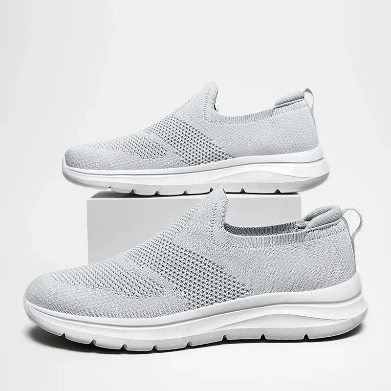 Slip-on knit walking shoes for men and women, featuring superior comfort and lightweight feel.