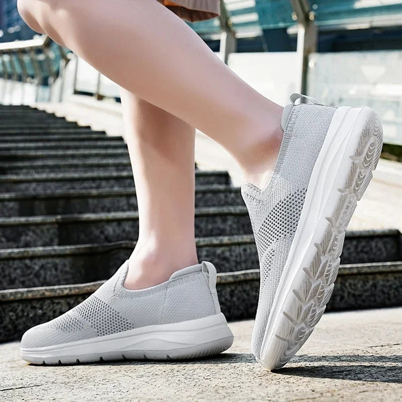 Durable knit slip-on walking shoes, breathable and comfortable for unisex casual wear.