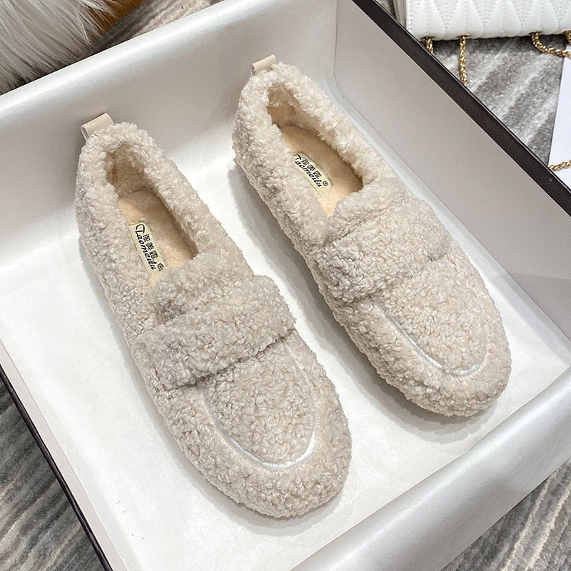 Warm and cozy unisex winter slippers for indoor comfort, perfect cold weather footwear.