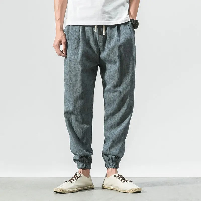 Breathable ultra-light athletic joggers for unisex comfort and versatile loungewear.
