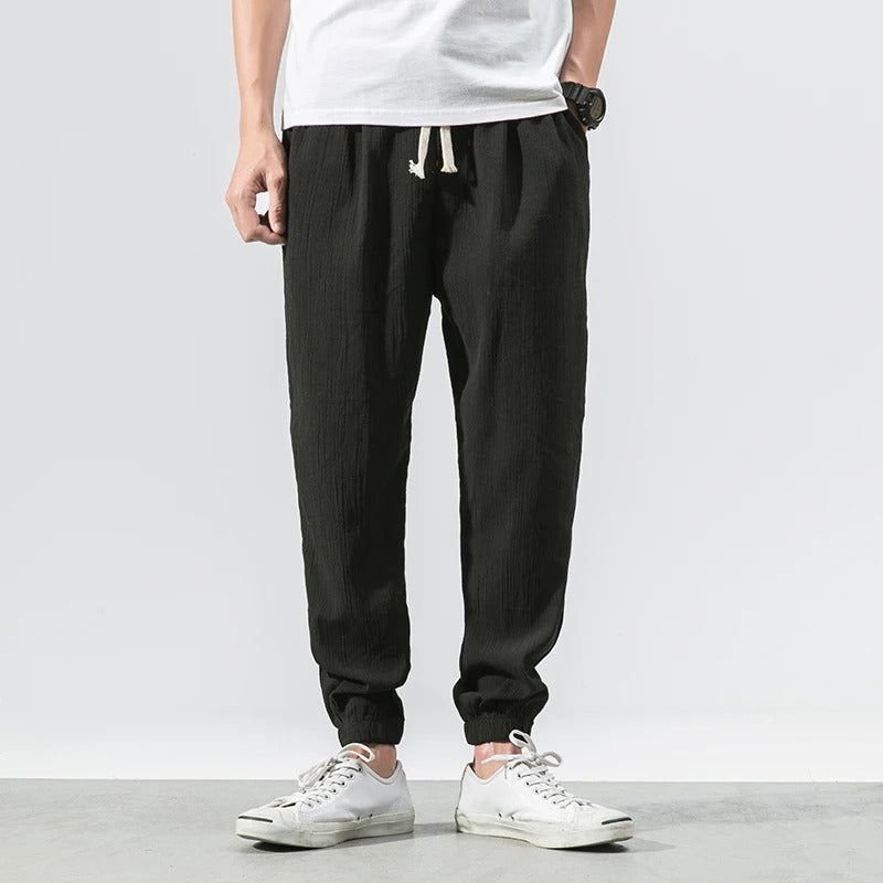 Casual cotton blend unisex joggers with a relaxed fit, ideal for comfort and activewear.
