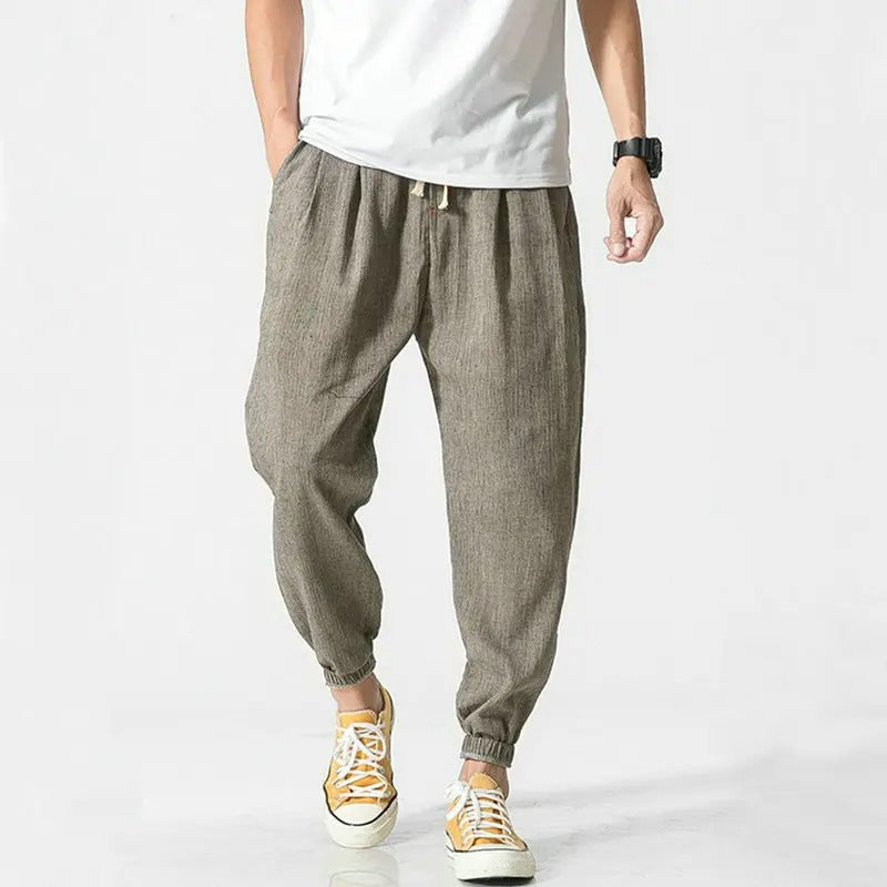 Unisex ultra-light joggers, a comfy cotton blend with relaxed fit, perfect for activewear & loungewear.