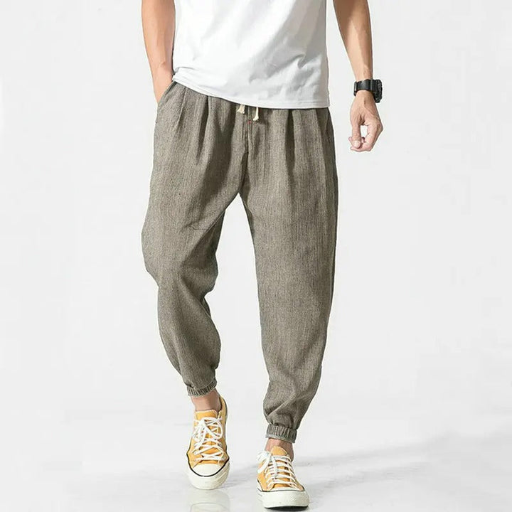 Unisex ultra-light joggers, a comfy cotton blend with relaxed fit, perfect for activewear & loungewear.
