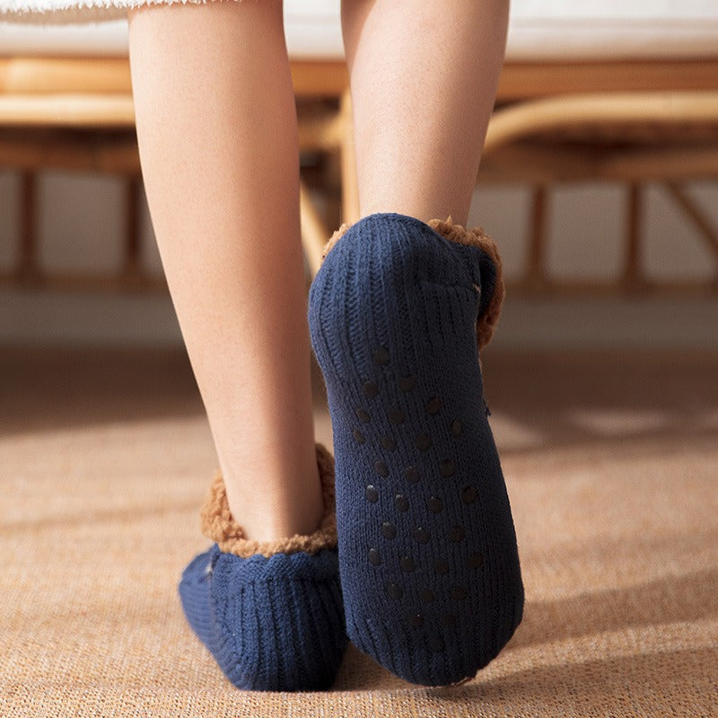 Cozy home socks with non-slip sole, ensuring warmth and safety indoors.