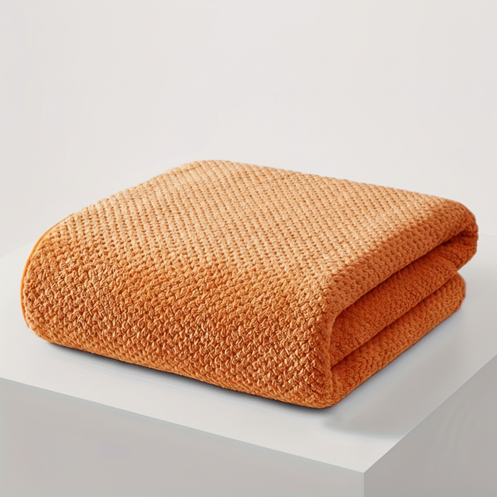 Full view of an oversized microfiber bath towel, showcasing its plush texture and absorbency