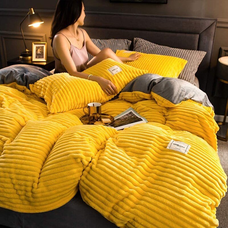 Plush winter duvet, a cozy fleece blanket in a bedroom setting, perfect for ultimate warmth.
