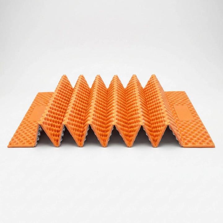 Close-up of textured ultralight camping mat, a comfortable and portable sleeping pad for hiking.