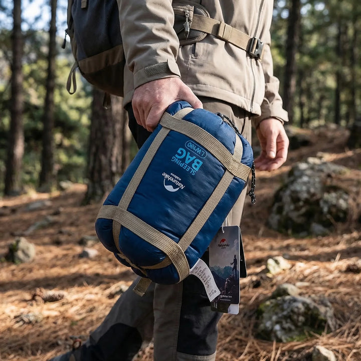 Unisex ultralight compact summer sleeping bag for hiking & backpacking. Ideal for warm weather camping trips.