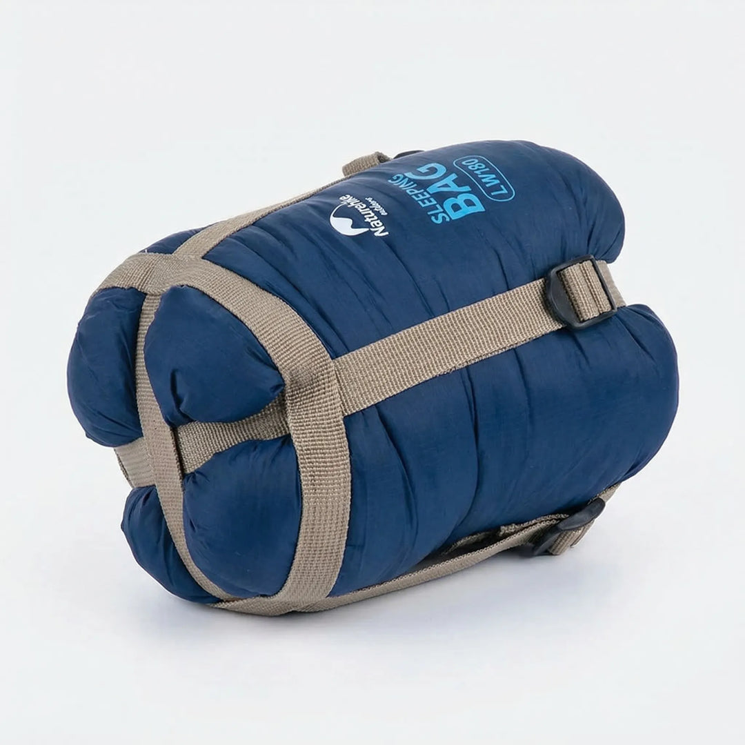 Compact ultralight summer sleeping bag. Water-repellent outdoor gear for hiking, camping & backpacking travel.