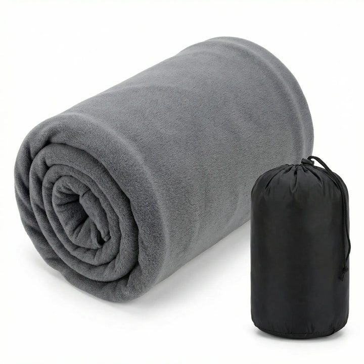 Warm fleece sleeping bag liner enhancing comfort for camping & hiking trips. Ultralight & cozy outdoor gear.