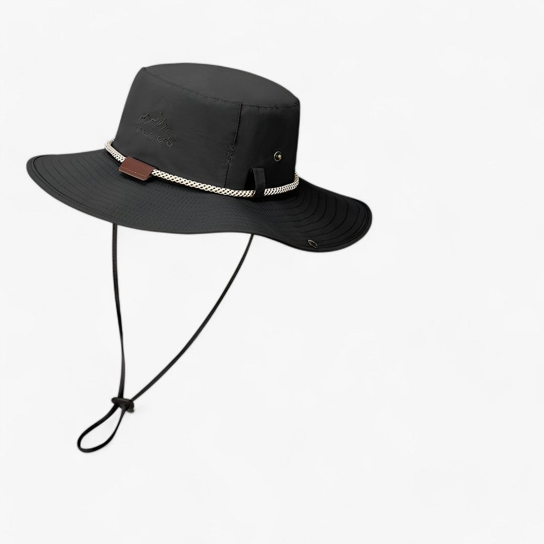 Waterproof travel bucket hat with UV protection, designed for both men and women, featuring a wide brim.
