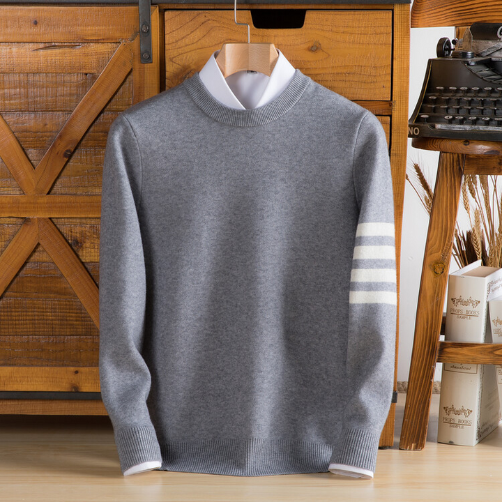 Stylish unisex varsity sweater, a comfortable knit pullover with a relaxed fit. Perfect casual top for any season.