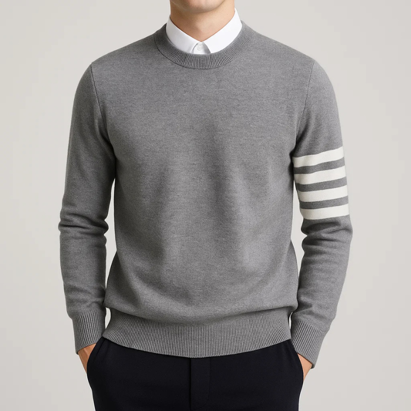 Casual unisex knit pullover with varsity styling and comfortable relaxed fit. Ideal cozy top for everyday wear.