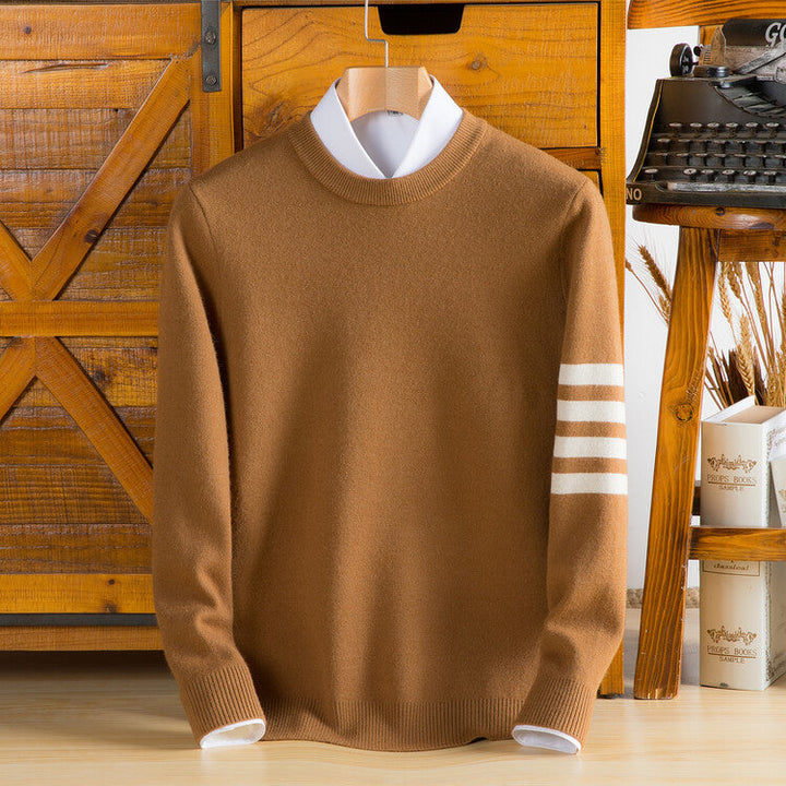 High-quality knit pullover, unisex varsity style. Features a soft, comfortable knit and classic striped sleeves.