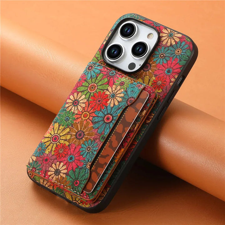 Unisex vegan leather iPhone wallet case with a stylish botanical floral print, integrated card holder.