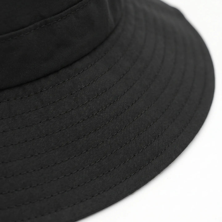 Stylish wide brim surf bucket hat. Unisex ventilated design provides excellent sun protection for all outdoor activities.