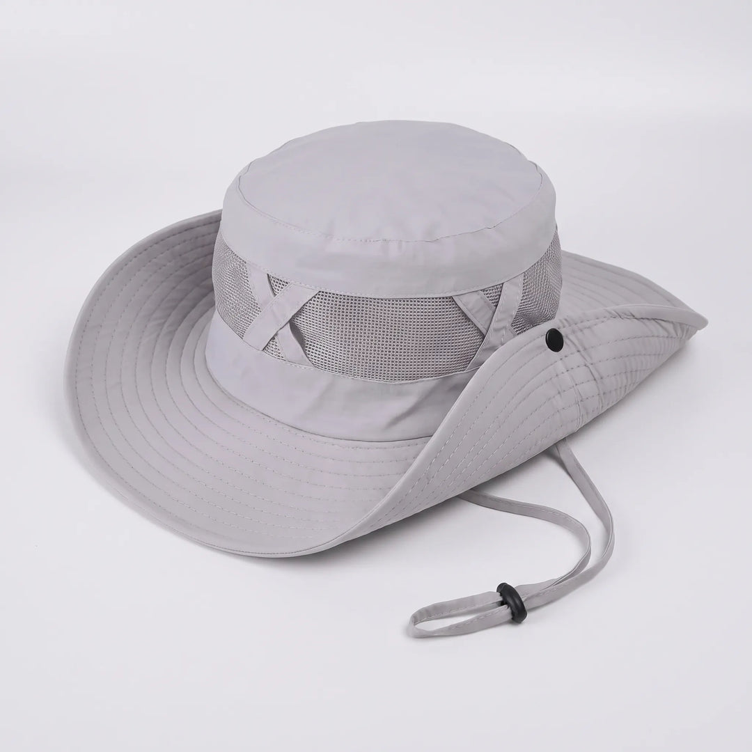 Outdoor sun hat with a wide brim & adjustable chin strap, offering UV protection for all activities.