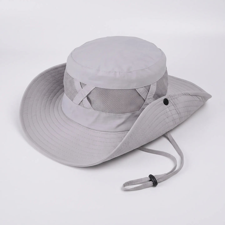 Outdoor sun hat with a wide brim & adjustable chin strap, offering UV protection for all activities.
