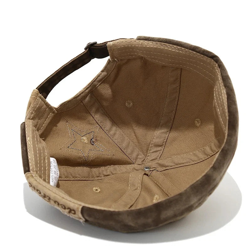 Fashionable vintage distressed star patch baseball cap, perfect for a casual look.