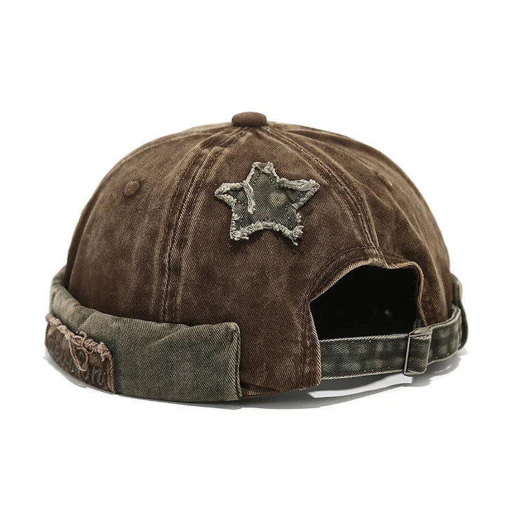 Unisex vintage baseball cap, distressed and embroidered with a bold star patch.
