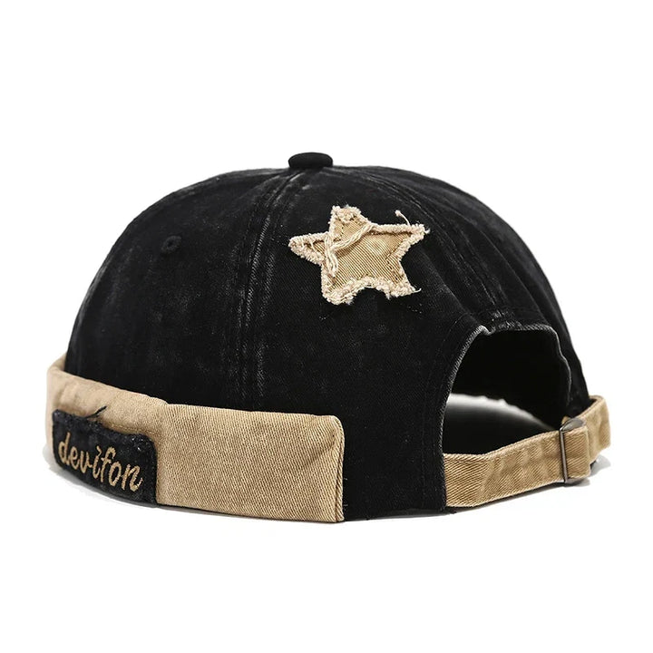 Distressed star patch cotton baseball cap, vintage aesthetic, adjustable unisex design.