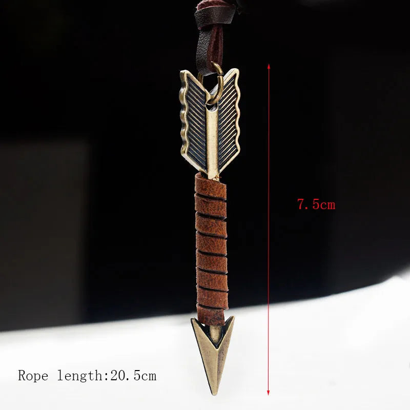 Close-up of a handcrafted vintage leather arrow pendant necklace, perfect for bohemian look.