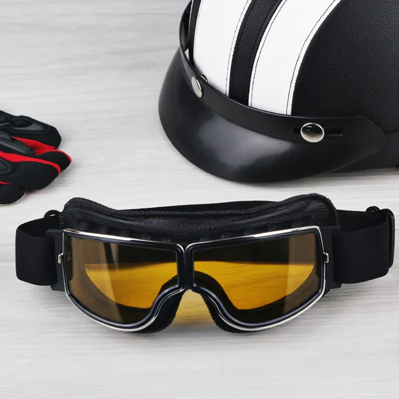 Motorcycle goggles on a classic helmet, showcasing retro rider accessories.