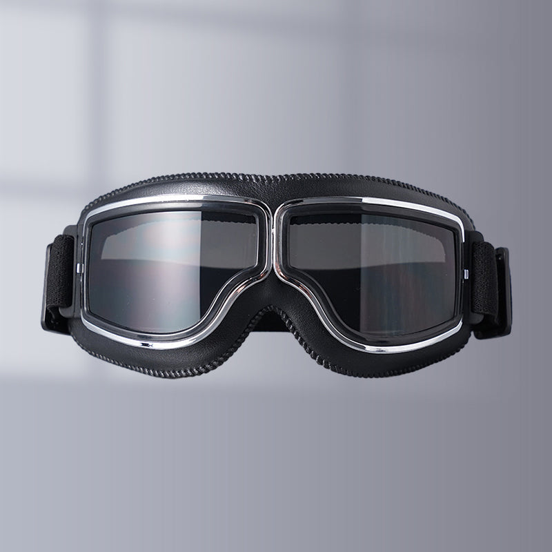 Classic black motorcycle goggles, perfect for wind protection & outdoor sports.