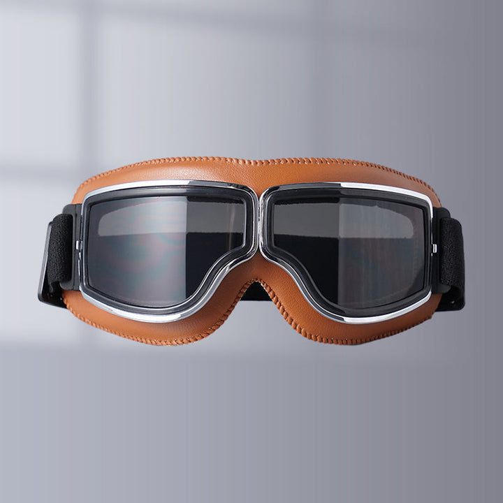 Stylish unisex motorcycle goggles for riders, classic design, ultimate eye safety.