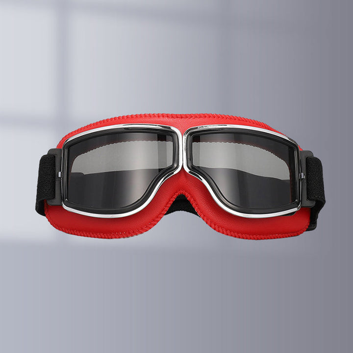 Retro chrome-framed motorcycle goggles, adjustable strap, UV protected lenses.