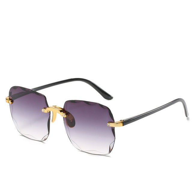 Trendy rimless vintage sunglasses for men & women, offering stylish look & essential UV400 eye protection.