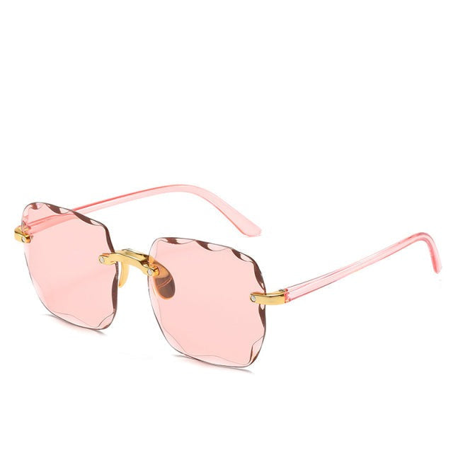 Vintage rimless sunglasses with square lenses & UV400 protection. Trendy, lightweight eyewear for everyday style.