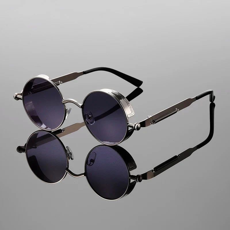 Classic vintage round unisex sunglasses with gradient lenses, providing stylish retro eyewear and UV protection.