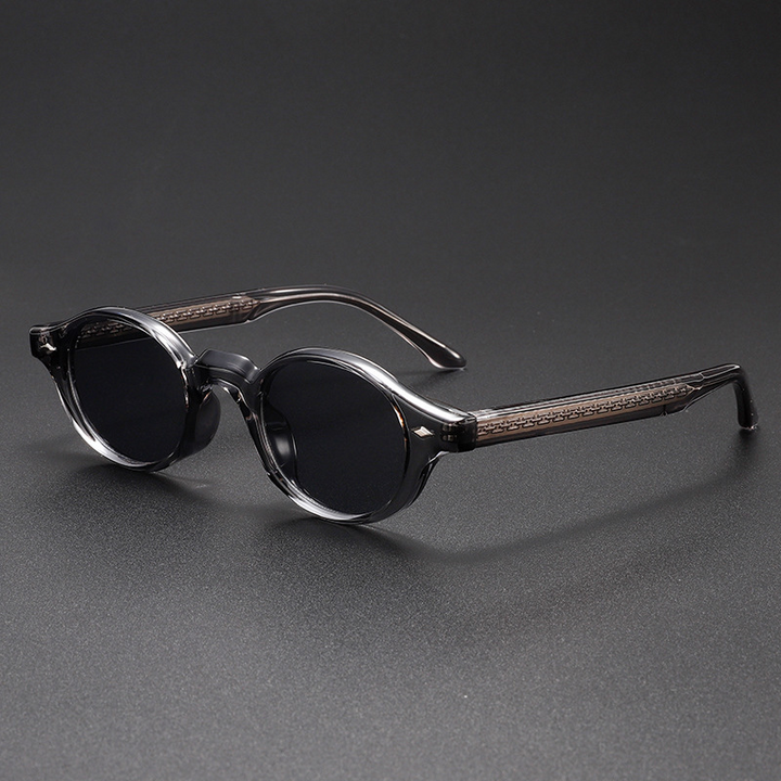 Unisex vintage sculpted oval sunglasses with an acetate frame & UV400 lenses for stylish eye protection.