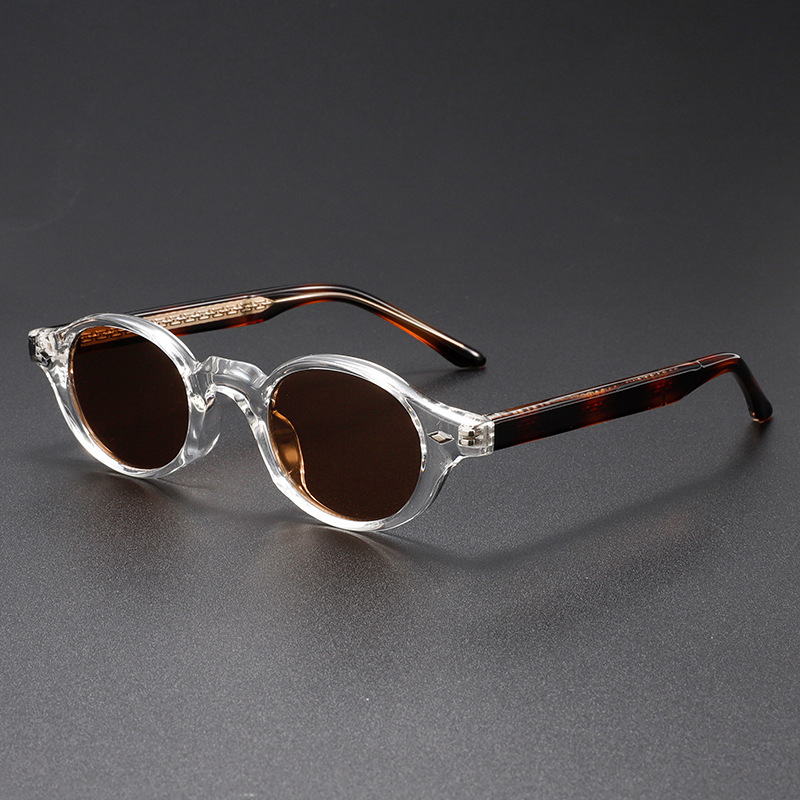 Retro unisex oval sunglasses, a stylish fashion accessory with a unique sculpted acetate frame & UV400 protection.