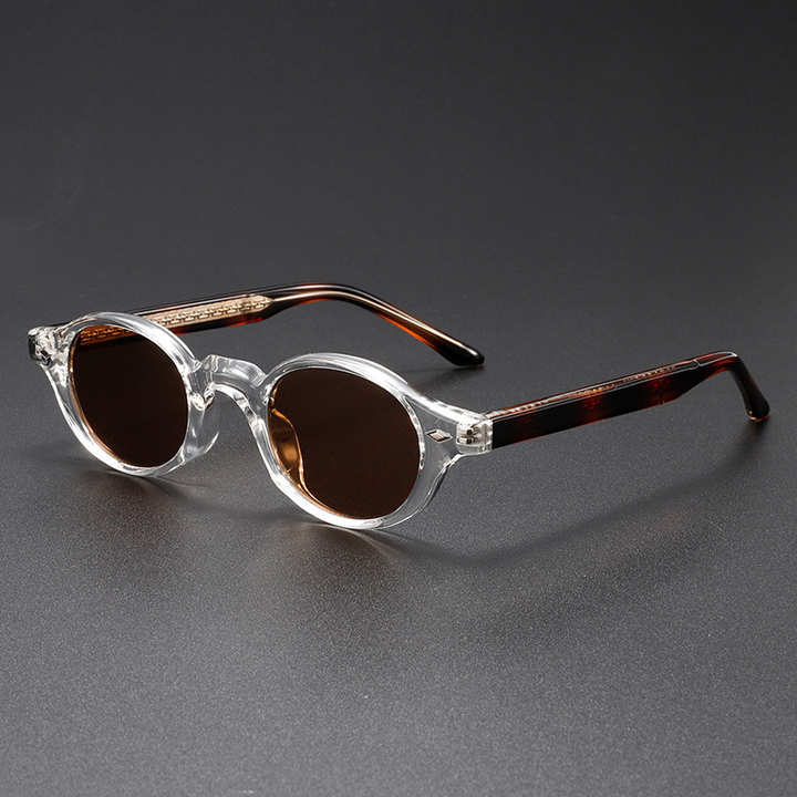Retro unisex oval sunglasses, a stylish fashion accessory with a unique sculpted acetate frame & UV400 protection.