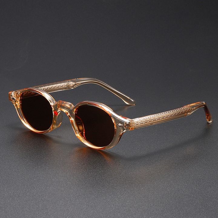 Stylish vintage oval sunglasses for unisex wear, with a sculpted acetate frame and UV400 lenses for eye protection.