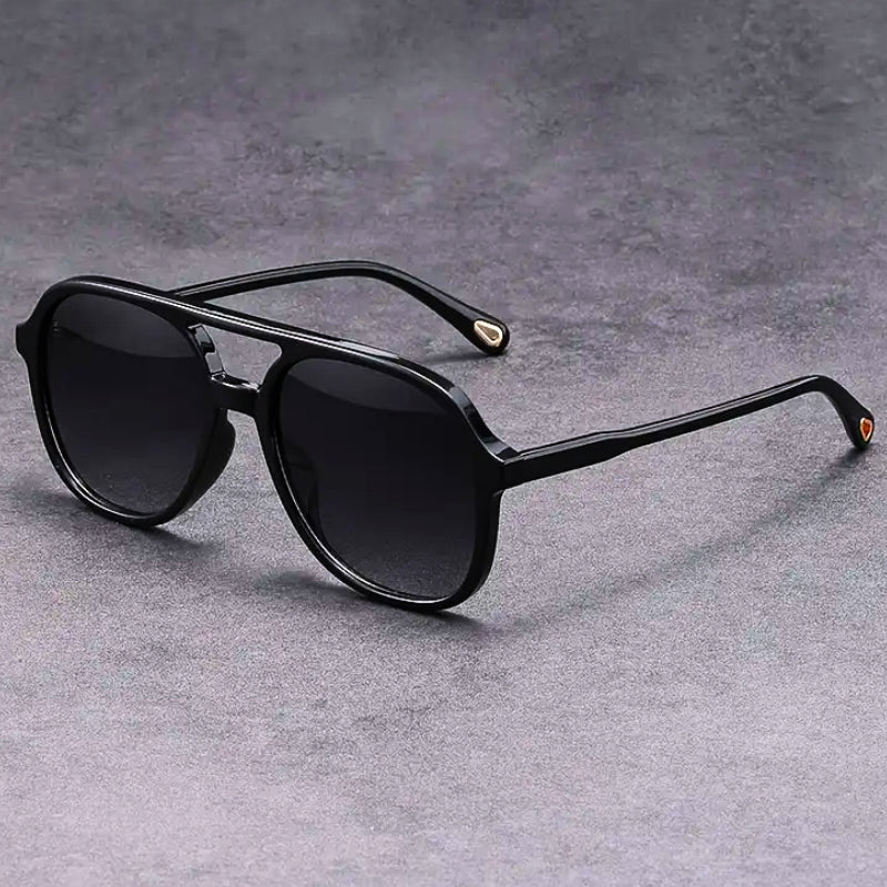 Black frame unisex vintage UV400 sunglasses with glare protection. Trendy eyewear for summer accessories.